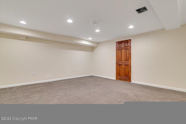 finished basement featuring carpet floors, recessed lighting, and baseboards