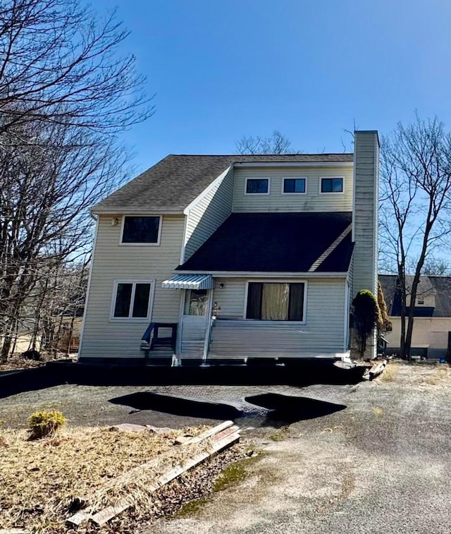1905 Horseshoe Bnd, Tobyhanna, PA 18466 - view of front of house featuring a chimney