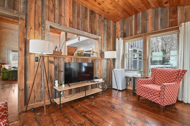 living area featuring wood ceiling, wood walls, and wood-type flooring