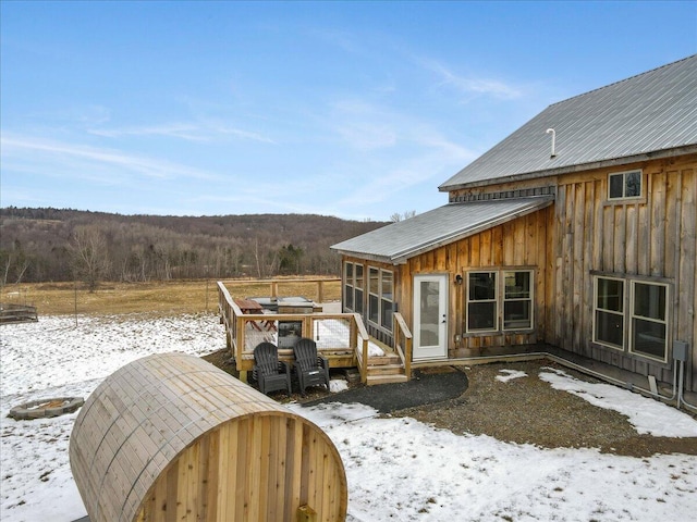 exterior space featuring a wooden deck