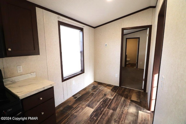 interior space featuring ornamental molding, dark wood-style flooring, and visible vents