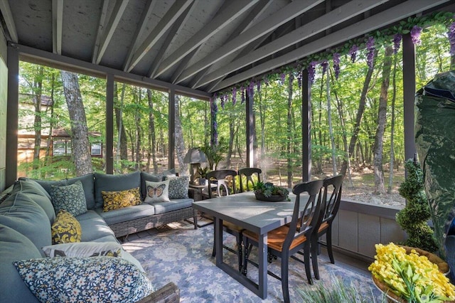 1237 Brentwood Dr, East Stroudsburg, PA 18301 - sunroom / solarium featuring outdoor lounge area, lofted ceiling, plenty of natural light, and outdoor dining space