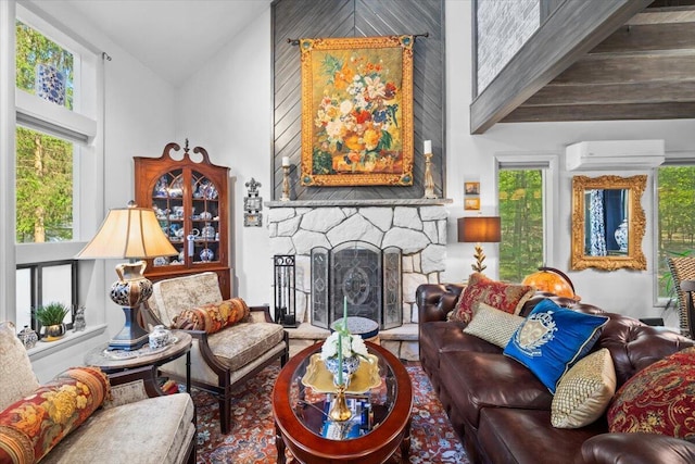 1237 Brentwood Dr, East Stroudsburg, PA 18301 - living area featuring a wall unit AC, high vaulted ceiling, healthy amount of natural light, and a fireplace