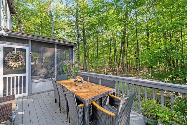 1237 Brentwood Dr, East Stroudsburg, PA 18301 - wooden terrace featuring outdoor dining area and a sunroom