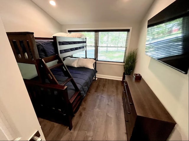 bedroom with recessed lighting, vaulted ceiling, and dark wood-style floors