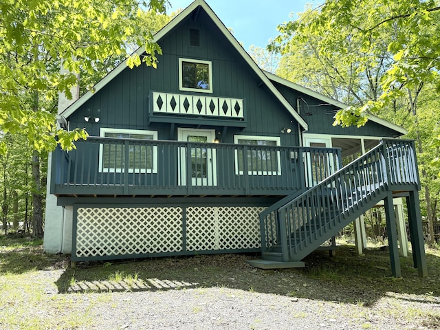 3176 Cherry Ridge Rd, Bushkill, PA 18324 - rear view of property with stairway, a chimney, and a deck