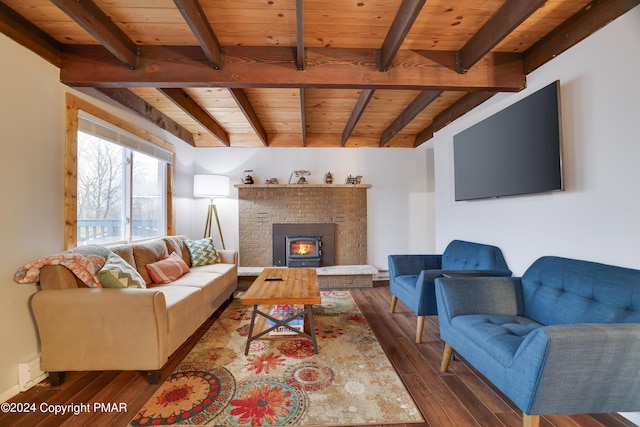 living area with dark wood-type flooring, beam ceiling, and wood ceiling