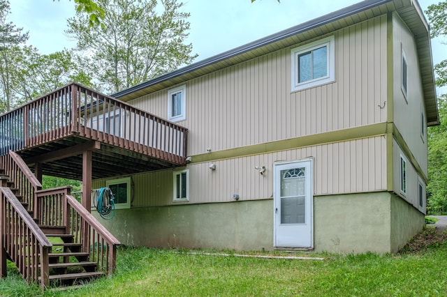 205 W Williams Ct, Stroudsburg, PA 18360 - back of house featuring stairway, a deck, and a yard