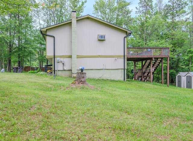 205 W Williams Ct, Stroudsburg, PA 18360 - view of property exterior with stairway, a shed, a wooden deck, and a yard