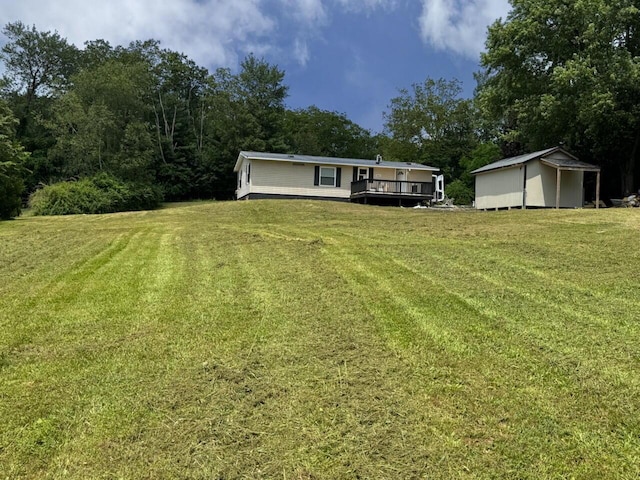 3546 High Hill Rd, Effort, PA 18330 - view of grassy yard with a wooden deck and a storage unit