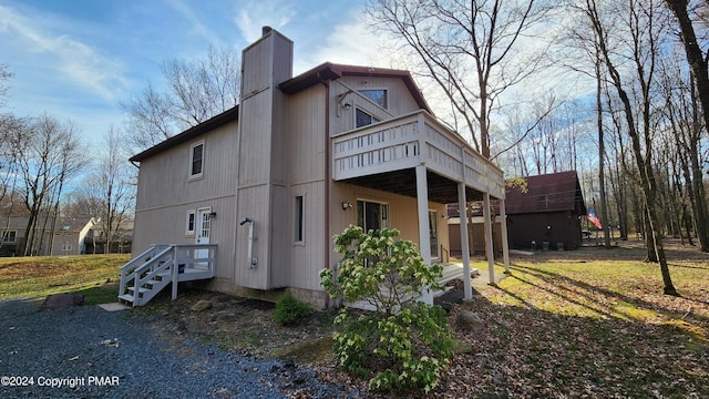 exterior space featuring a chimney