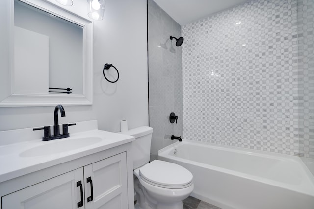bathroom with vanity, shower / tub combination, and toilet