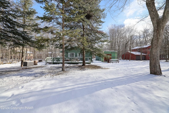 view of front of home with a wooden deck