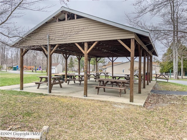 view of property's community with a yard and a gazebo