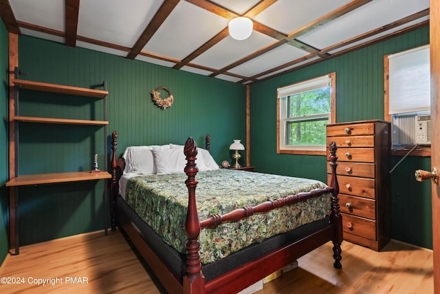 bedroom featuring wood finished floors