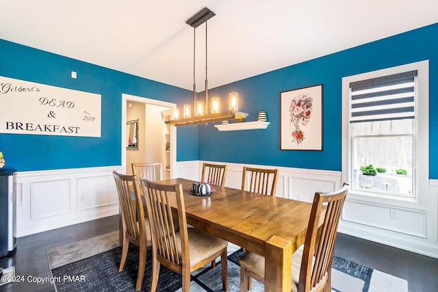 dining room featuring a wainscoted wall