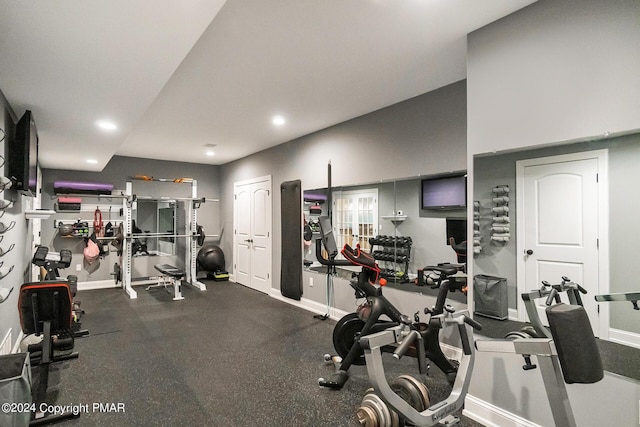 gym featuring baseboards