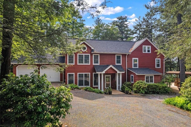105 Waygood Way, Pocono Pines, PA 18350 - view of front of property featuring dirt driveway, a shingled roof, and a garage