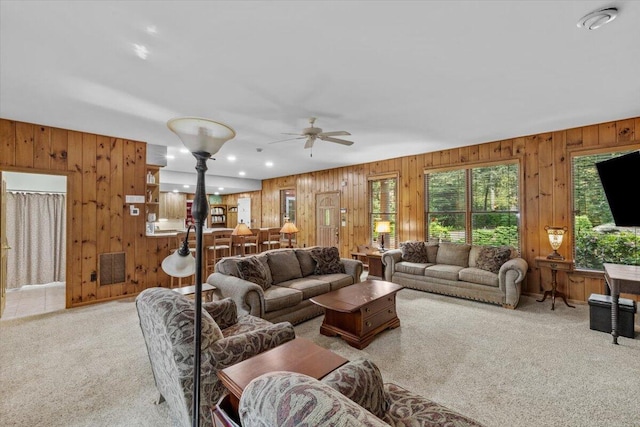 105 Waygood Way, Pocono Pines, PA 18350 - living area featuring wooden walls, carpet, ceiling fan, and recessed lighting