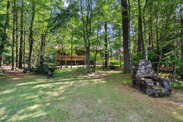 105 Waygood Way, Pocono Pines, PA 18350 - view of grassy yard with a deck and a forest view