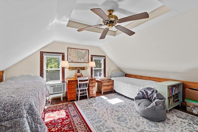 105 Waygood Way, Pocono Pines, PA 18350 - bedroom featuring lofted ceiling, a ceiling fan, a wall unit AC, and wood finished floors
