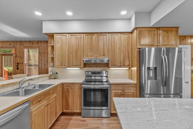 105 Waygood Way, Pocono Pines, PA 18350 - kitchen featuring appliances with stainless steel finishes, under cabinet range hood, light countertops, light wood finished floors, and open shelves