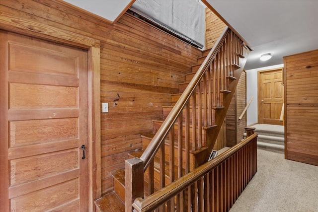 105 Waygood Way, Pocono Pines, PA 18350 - staircase with carpet flooring and wooden walls