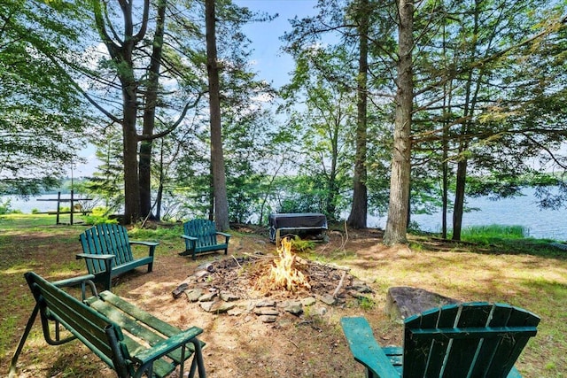105 Waygood Way, Pocono Pines, PA 18350 - view of yard featuring an outdoor fire pit and a water view