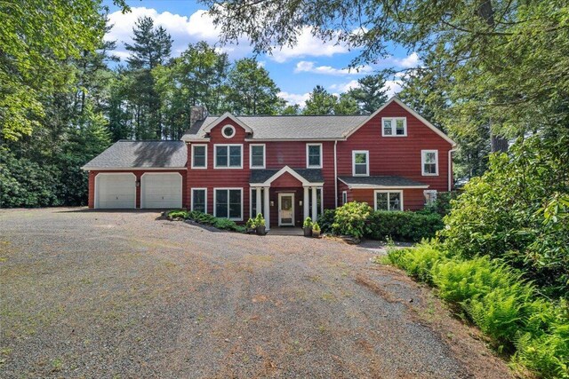 105 Waygood Way, Pocono Pines, PA 18350 - view of front facade featuring a garage, a chimney, and driveway