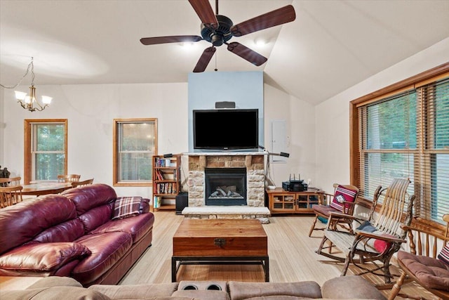 105 Waygood Way, Pocono Pines, PA 18350 - living room featuring a chandelier, light wood-style floors, ceiling fan, plenty of natural light, and vaulted ceiling