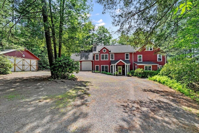 105 Waygood Way, Pocono Pines, PA 18350 - view of front of property with driveway, an attached garage, and an outdoor structure