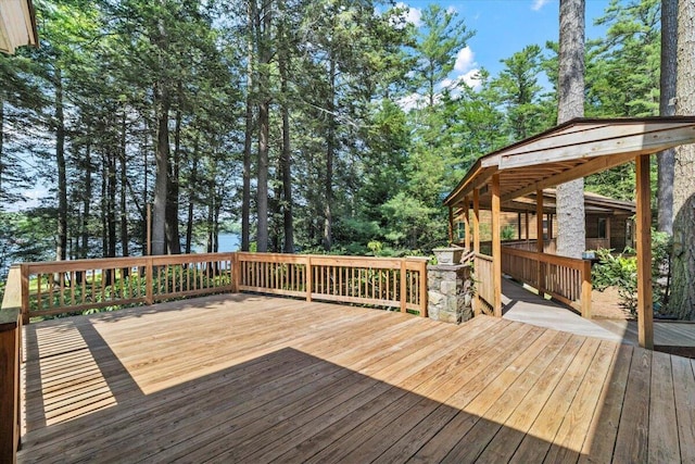 105 Waygood Way, Pocono Pines, PA 18350 - wooden terrace featuring view of wooded area