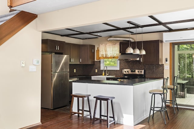 205 Victory Ln, Long Pond, PA 18334 - kitchen with stainless steel appliances, a wall unit AC, ventilation hood, and dark wood-style floors