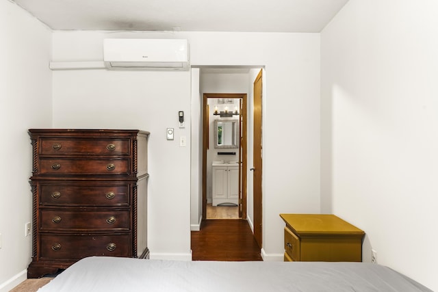205 Victory Ln, Long Pond, PA 18334 - bedroom featuring a wall mounted air conditioner, baseboards, and wood finished floors
