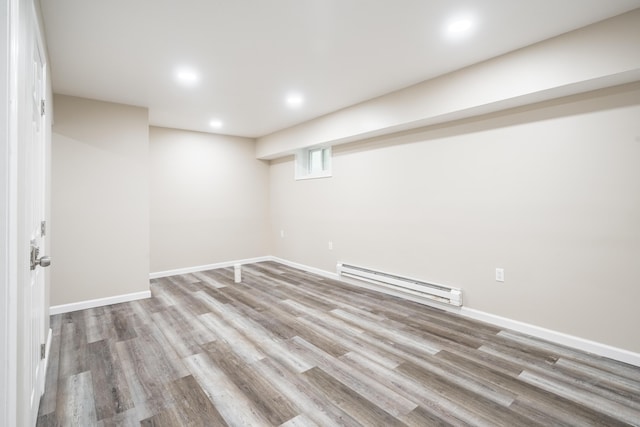 205 Victory Ln, Long Pond, PA 18334 - basement with a baseboard radiator, wood finished floors, baseboards, and recessed lighting