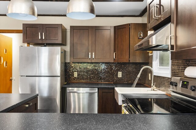 205 Victory Ln, Long Pond, PA 18334 - kitchen featuring appliances with stainless steel finishes, dark countertops, backsplash, and dark brown cabinets