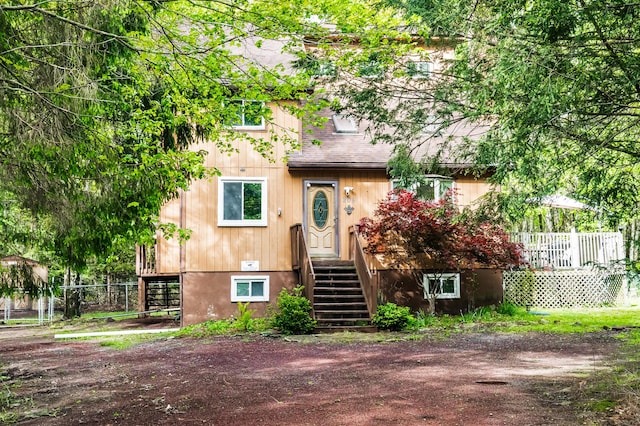 205 Victory Ln, Long Pond, PA 18334 - view of front facade with a shingled roof and stairway