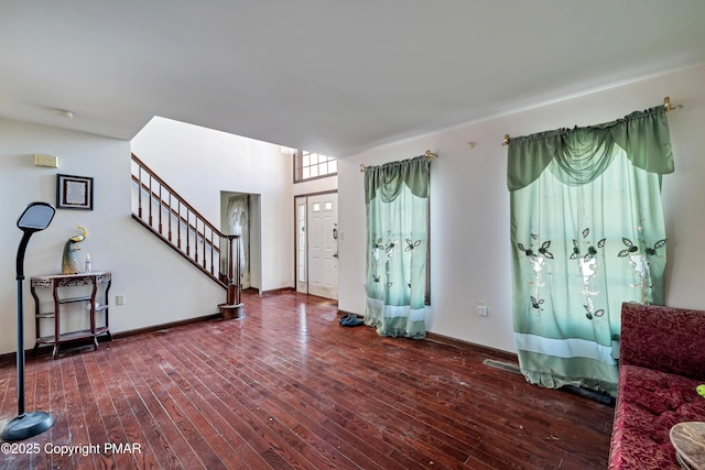 entrance foyer with hardwood / wood-style floors