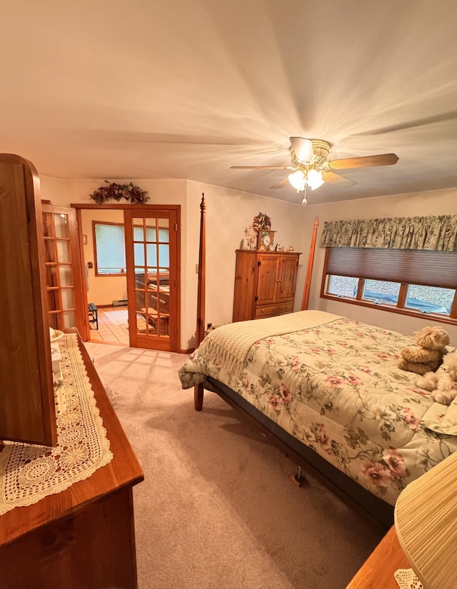 155 Clifton Dr, Bushkill, PA 18324 - carpeted bedroom featuring arched walkways and a ceiling fan