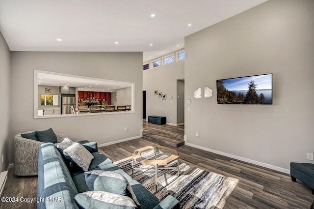 181 Williams Ln, Scotrun, PA 18355 - living room featuring wood finished floors, recessed lighting, baseboards, and a towering ceiling