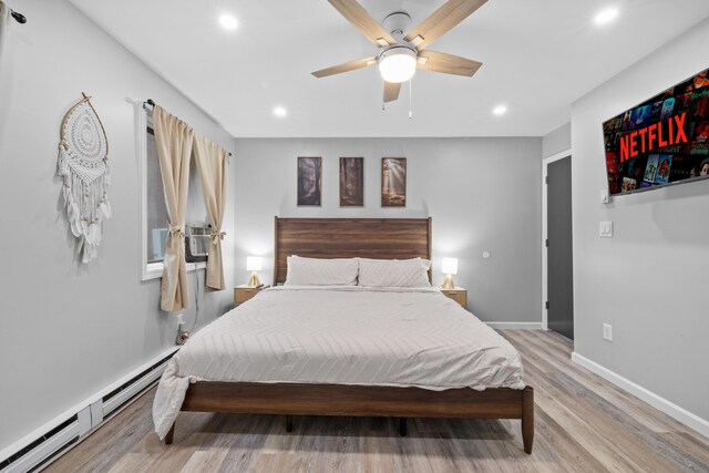 181 Williams Ln, Scotrun, PA 18355 - bedroom featuring a baseboard heating unit, light wood-style floors, recessed lighting, and a ceiling fan