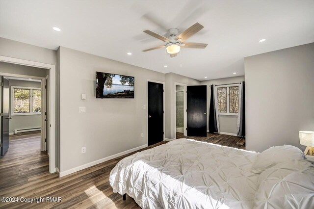 181 Williams Ln, Scotrun, PA 18355 - bedroom with a baseboard radiator, wood finished floors, baseboards, recessed lighting, and a ceiling fan