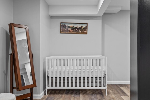 181 Williams Ln, Scotrun, PA 18355 - bedroom with wood finished floors and a nursery area
