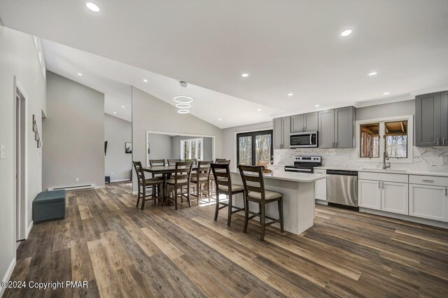 181 Williams Ln, Scotrun, PA 18355 - kitchen featuring stainless steel appliances, a sink, dark wood-type flooring, gray cabinets, and light countertops