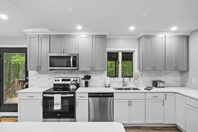 181 Williams Ln, Scotrun, PA 18355 - kitchen with appliances with stainless steel finishes, recessed lighting, light countertops, tasteful backsplash, and gray cabinetry
