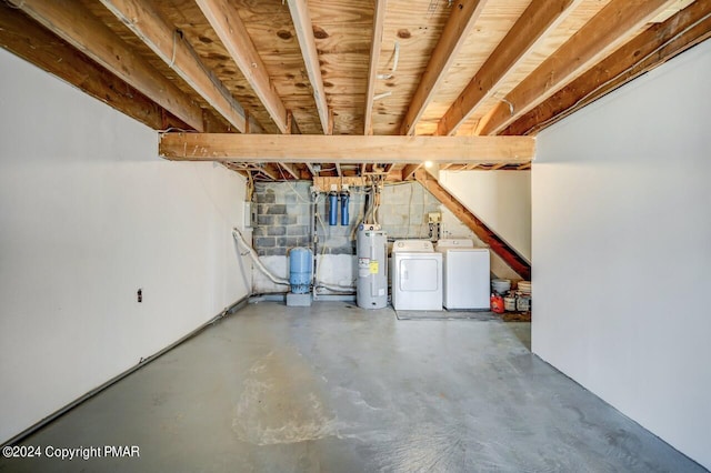 181 Williams Ln, Scotrun, PA 18355 - unfinished basement featuring washer and dryer, water heater, and a water pressure tank