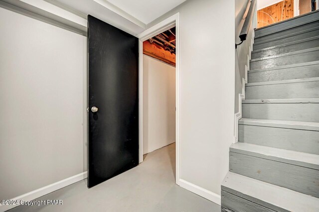 181 Williams Ln, Scotrun, PA 18355 - stairs with concrete floors and baseboards