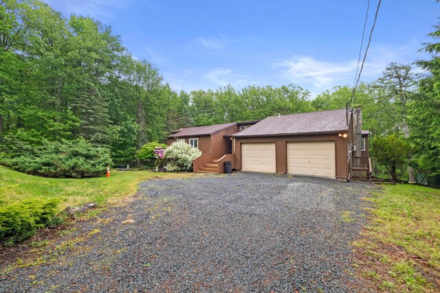 181 Williams Ln, Scotrun, PA 18355 - view of front of property with a chimney and a garage
