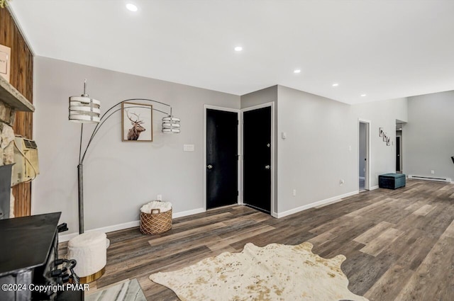 181 Williams Ln, Scotrun, PA 18355 - living room featuring wood finished floors, baseboards, recessed lighting, and a baseboard radiator