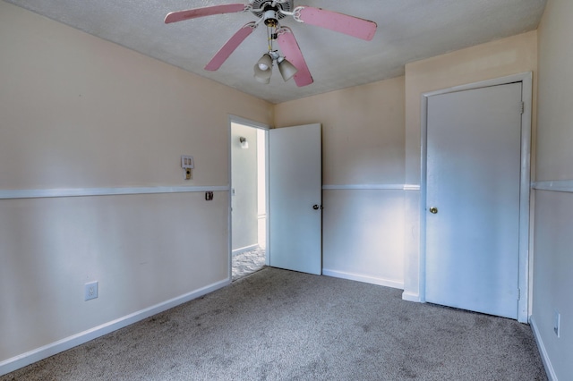 1452 Waterfront Dr, Tobyhanna, PA 18466 - unfurnished bedroom with carpet floors, baseboards, and ceiling fan